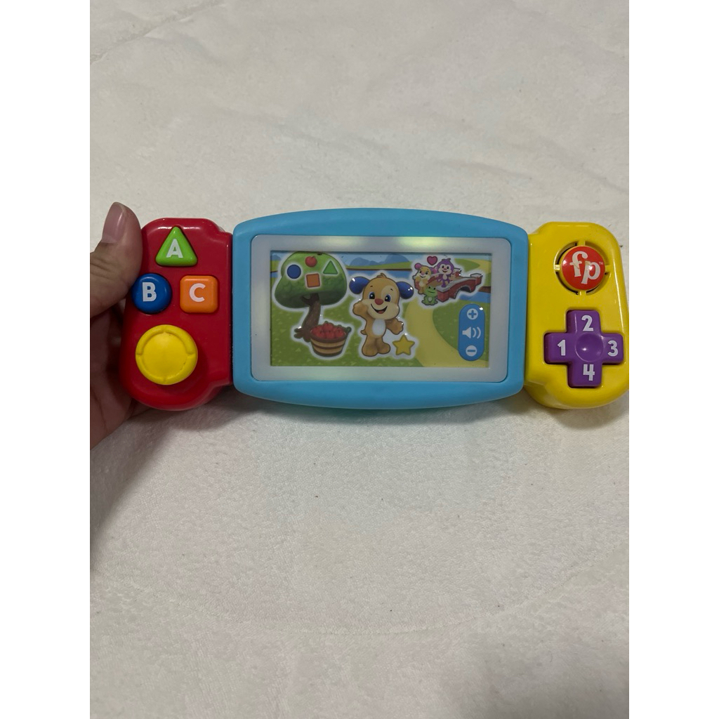 ของเล่นเครื่องเกมกด Fisher-Price รุ่น Laugh & Learn Twist & Learn Gamer