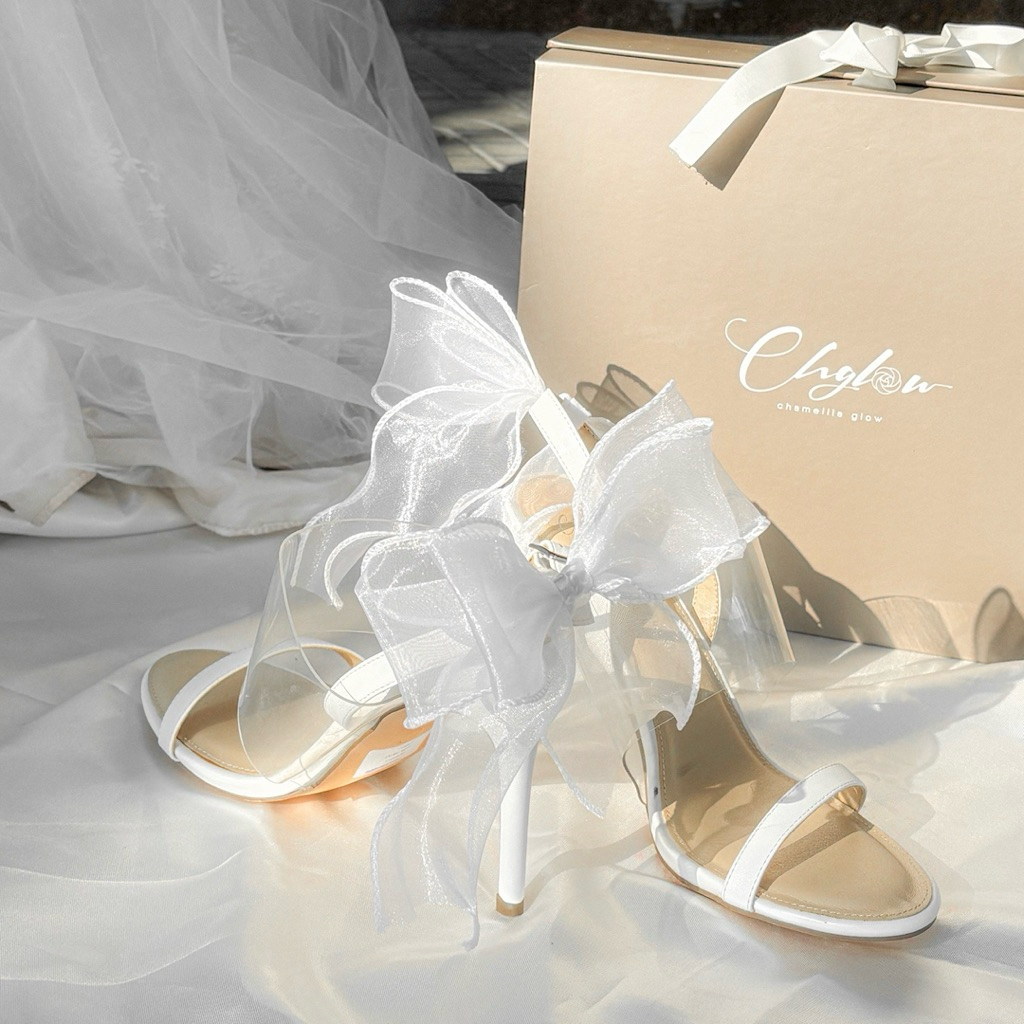 Chamellia Glow-Princess Bella รองเท้าส้นสูง รัดข้อมีโบว์ประดับด้านหลัง สูง 4 นิ้ว