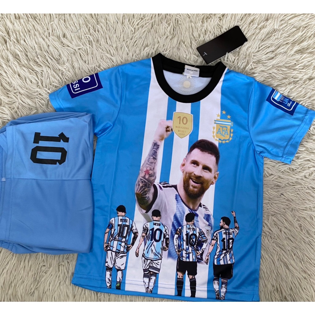 ชุดฟุตอลเด็กสีฟ้าสกรีนลายเมสชี่เบอร์10ชื่อMESSIเสื้อ+กางเกง