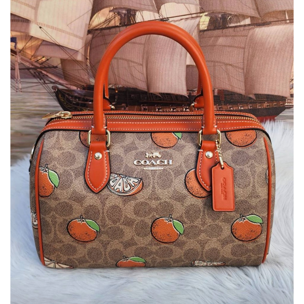 AD🎀(สด-ผ่อน) CAQ61 10 นิ้ว Rowan Satchel Bag In Signature Canvas With Orange Print