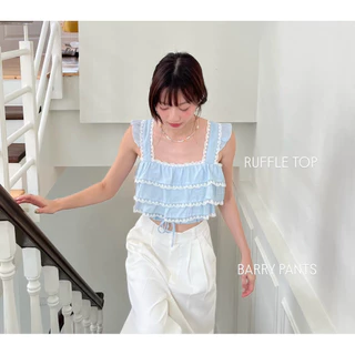RUFFLE TOP - เสื้อแขนกุด ดีเทลแขนระบาย และจับระบายช่วงตัวเสื้อ (nita.bkk)