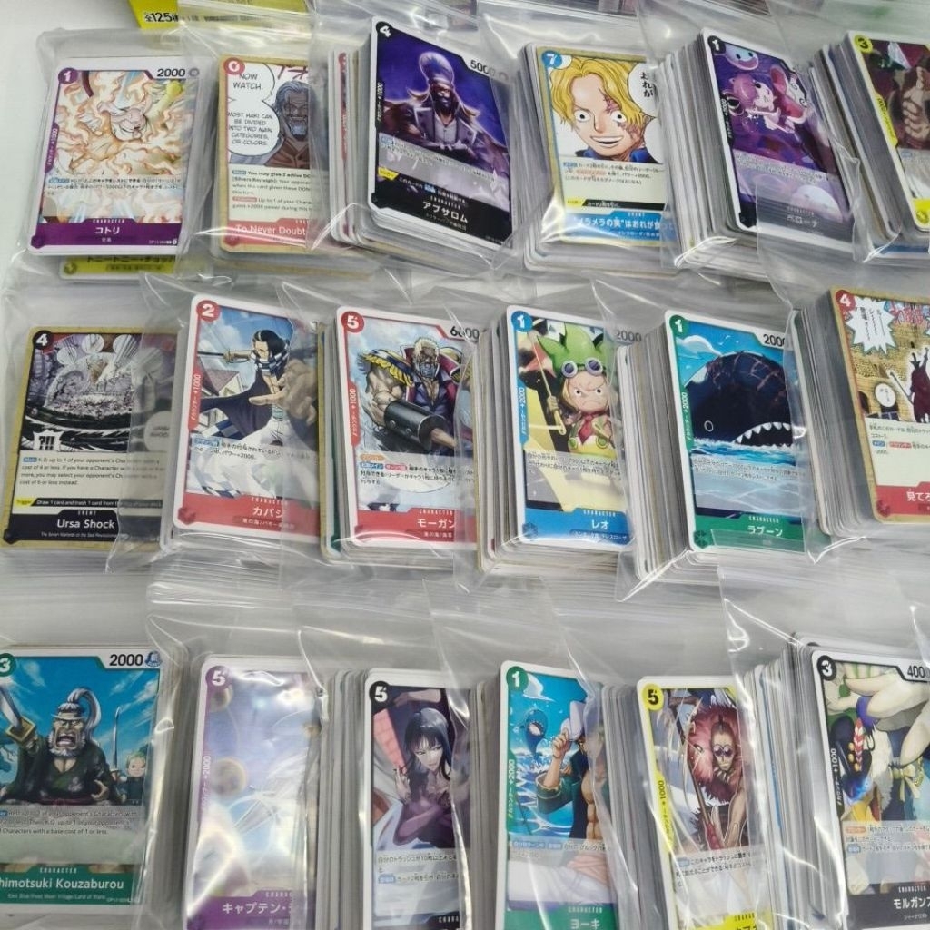 ส่งด่วน ส่งจาก กทม. One Piece Card Card Common Uncom ของแท้ คละแบบ แยกขาย ซองละ 50 ใบ    ราคา 75 บาท