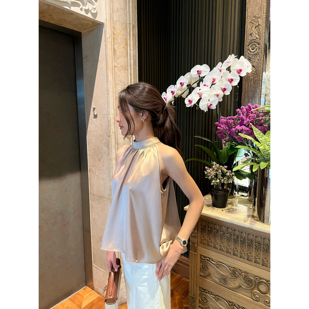 Liora satin top - A clean halter silhouette in satin, finished with a subtle shimmer