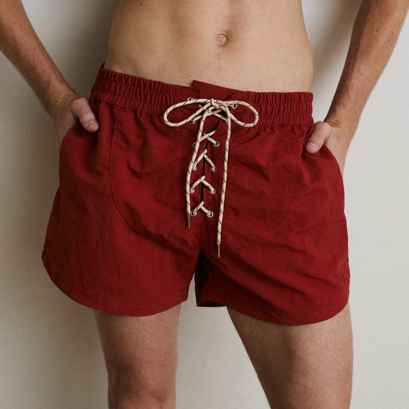 Hunter Studios - กางเกงขาสั้น ผ้าร่มย่น ดิเทลร้อยเชือกด้านหน้า รุ่นLace-Up Front Swim Shorts