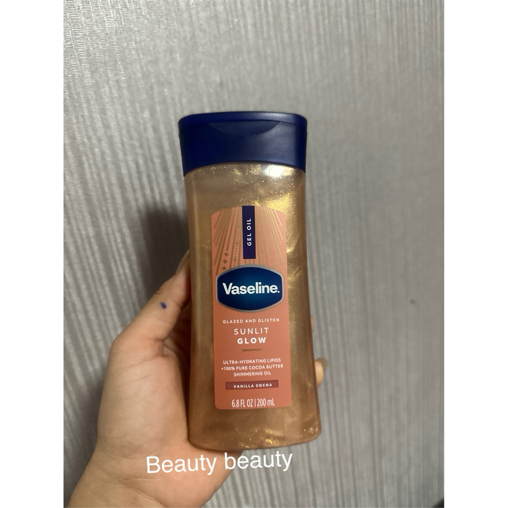 Vaseline Vanilla Glow Sunlit Shimmer Body Oil 200ml. วาสลีน นิลลา โกโก้ ชิมเมอร์