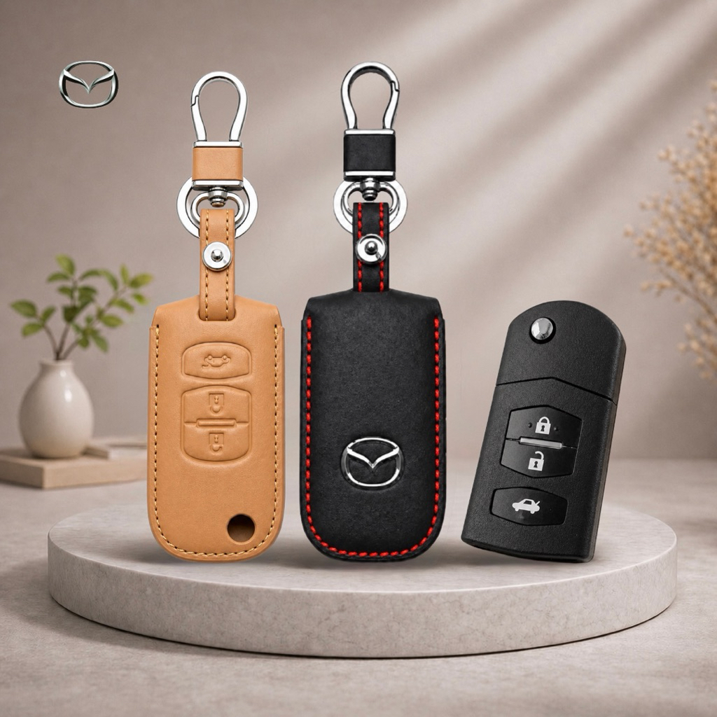 ซองหนังแท้ ใส่กุญแจรีโมทรถยนต์ รุ่นโลโก้เหล็ก Mazda 2,3 พับข้าง รุ่น 3 ปุ่ม