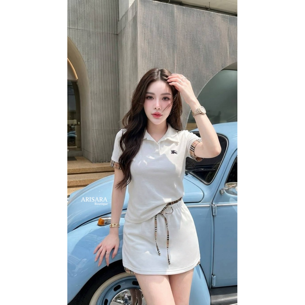 ชุดเซ็ต 2 ชิ้น เสื้อแต่งแถบที่แขน+กระโปรงเอวยางยืด ซับในกางเกง แต่งแถบด้านข้าง