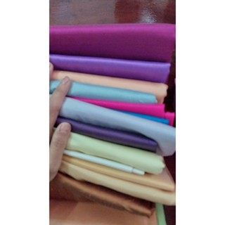 ผ้าไหมแท้สีพื้นเรียบ-ทอ2เส้น-(เนื้อผ้าทอแน่นละเอียดเงา)👉ราคา…