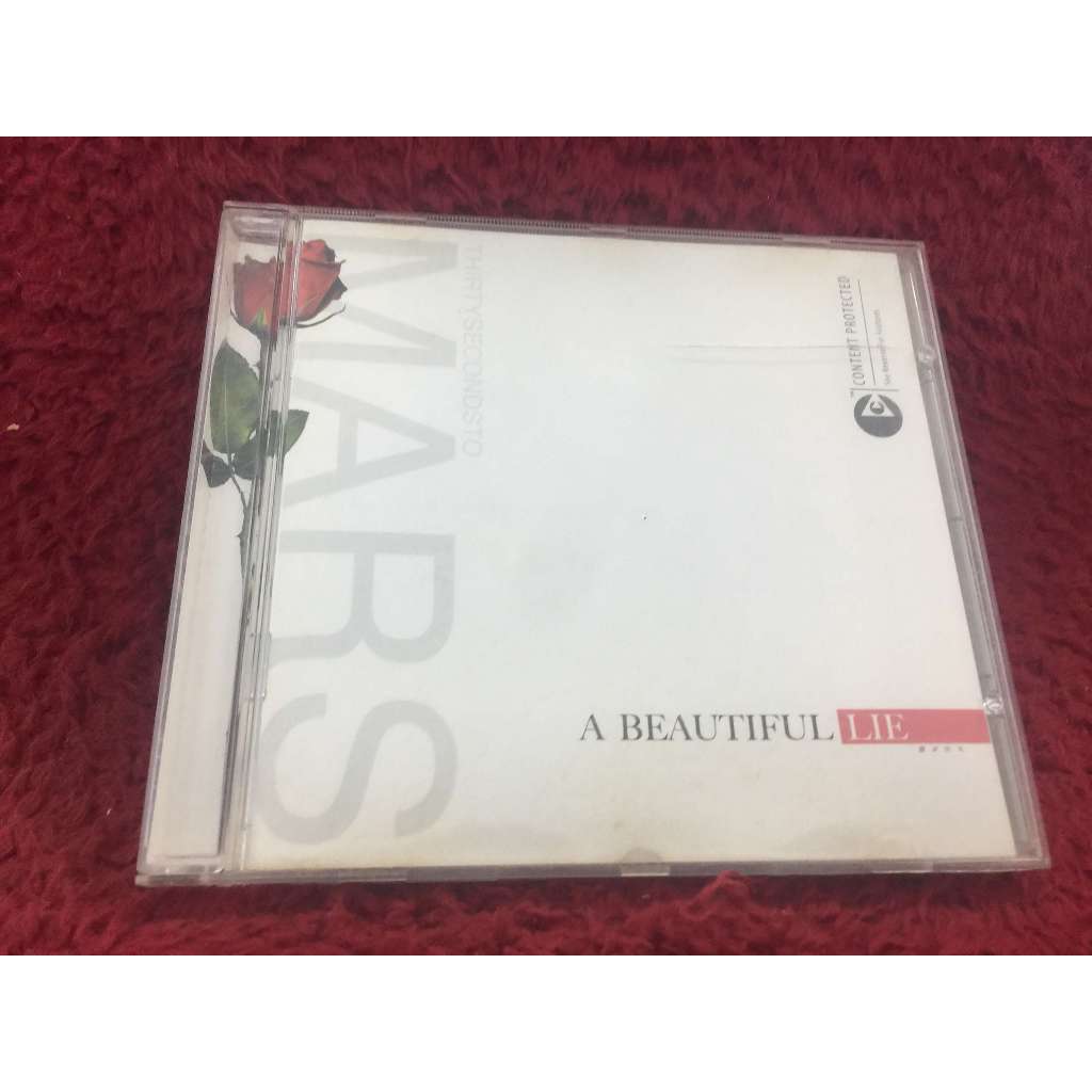 CD เพลงสากล Thirty Seconds To Mars – A Beautiful Lie สภาพตามรูปปก ZA117-94
