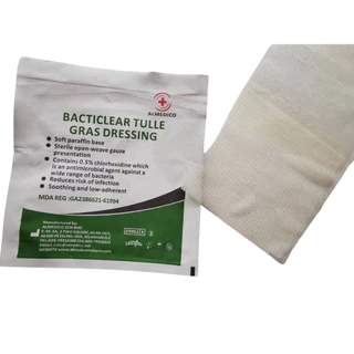 BACTIGRAS(กล่อง10ชิ้น) แผ่นตาข่ายปิดแผล 10x10CM เคลือบพาราฟิน ป้องกันผ้าก๊อซติดแผล