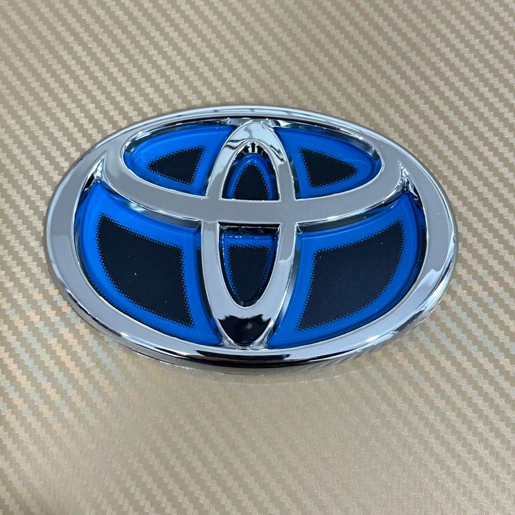 โลโก้* Toyota  พื้นอะคีลิค สีฟ้าไฮบริด ขนาด* 11 x 16 cm ราคาต่อขิ้น