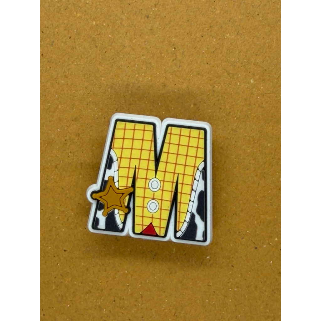 JIBBITZ-อักษรตัวMลิขสิทธิ์