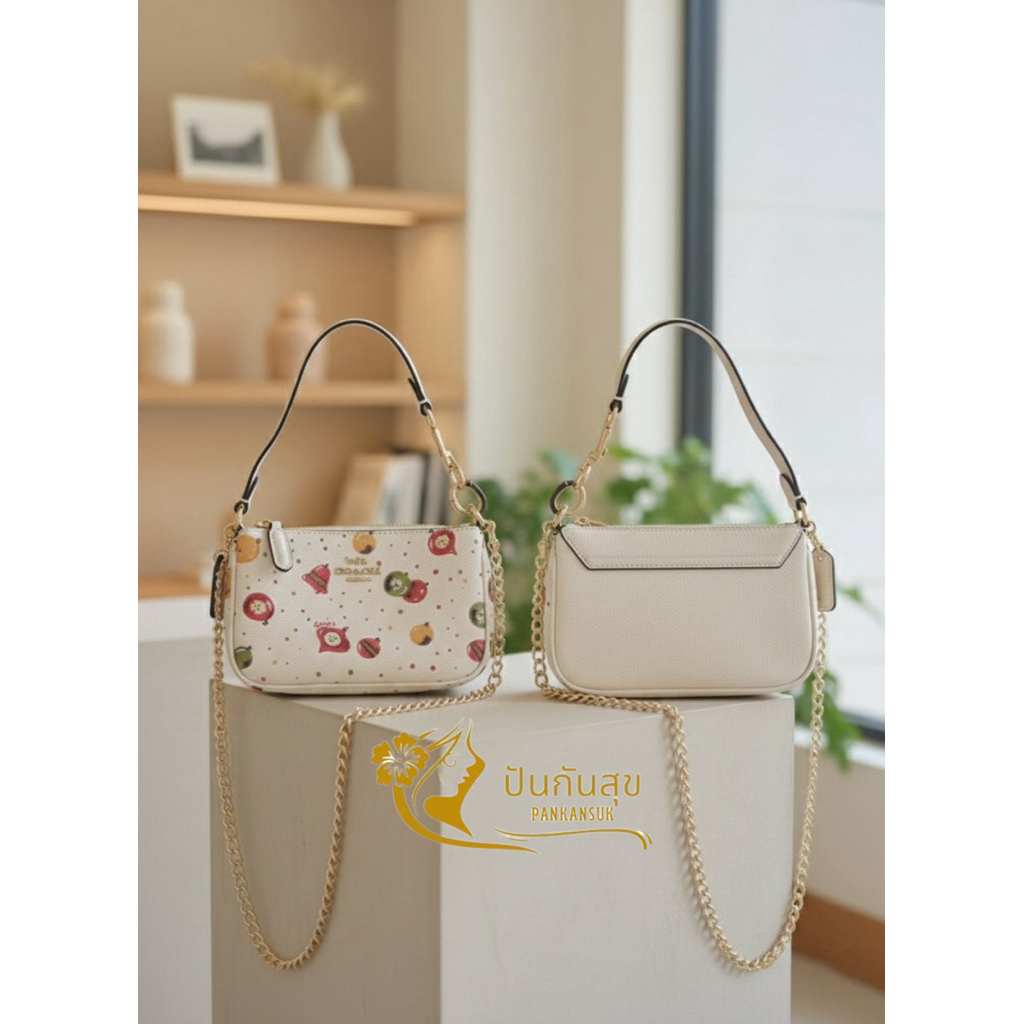 กระเป๋าใหม่  จากช็อป  Coach Nolita 15 (Mini Nolita) ลาย Festive Ornament