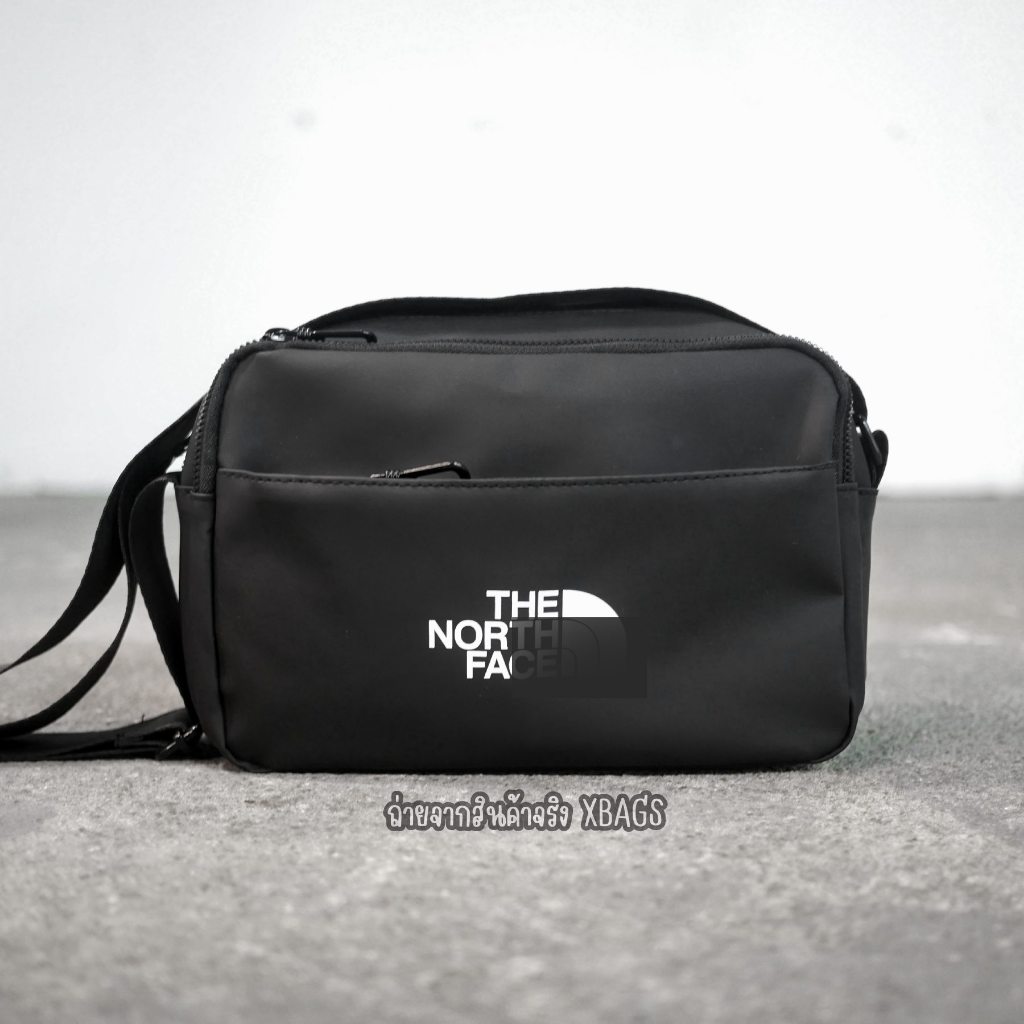 Tnf สะพายข้างหนังกันน้ำ มี 6 ช่องใส่ของซิปใหญ่ ขนาด 26 ซม.