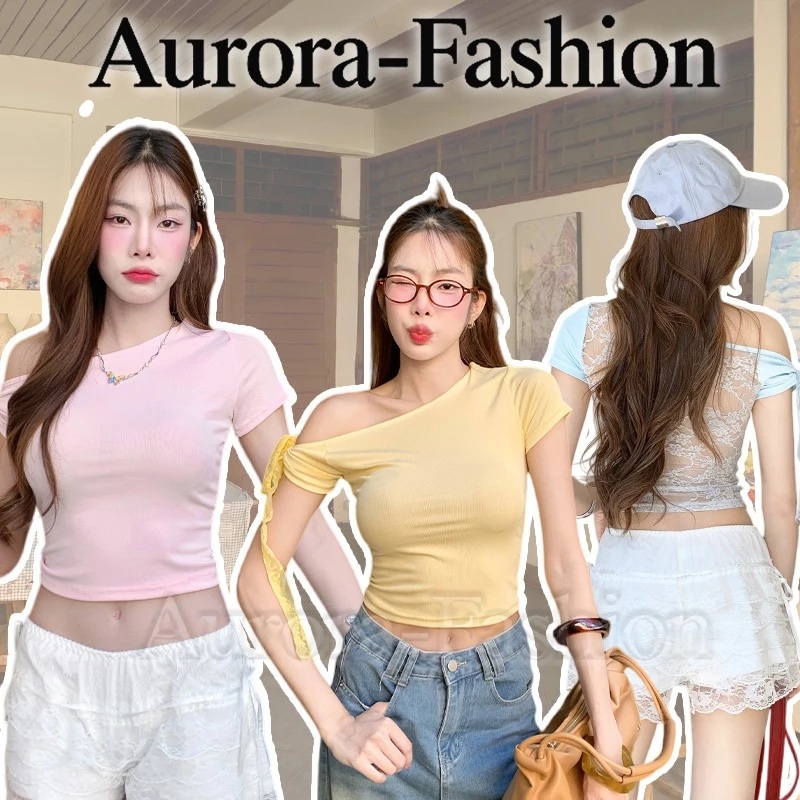 Aurora🛒พร้อมส่ง🚚 (รูปถ่ายจากงานจริง) เสื้อแฟชั่นผู้หญิง ปาดไหล่ การออกแบบเชือกรูปโบว์ น่ารัก น่ารักและหวาน รุ่นกระชับรูป
