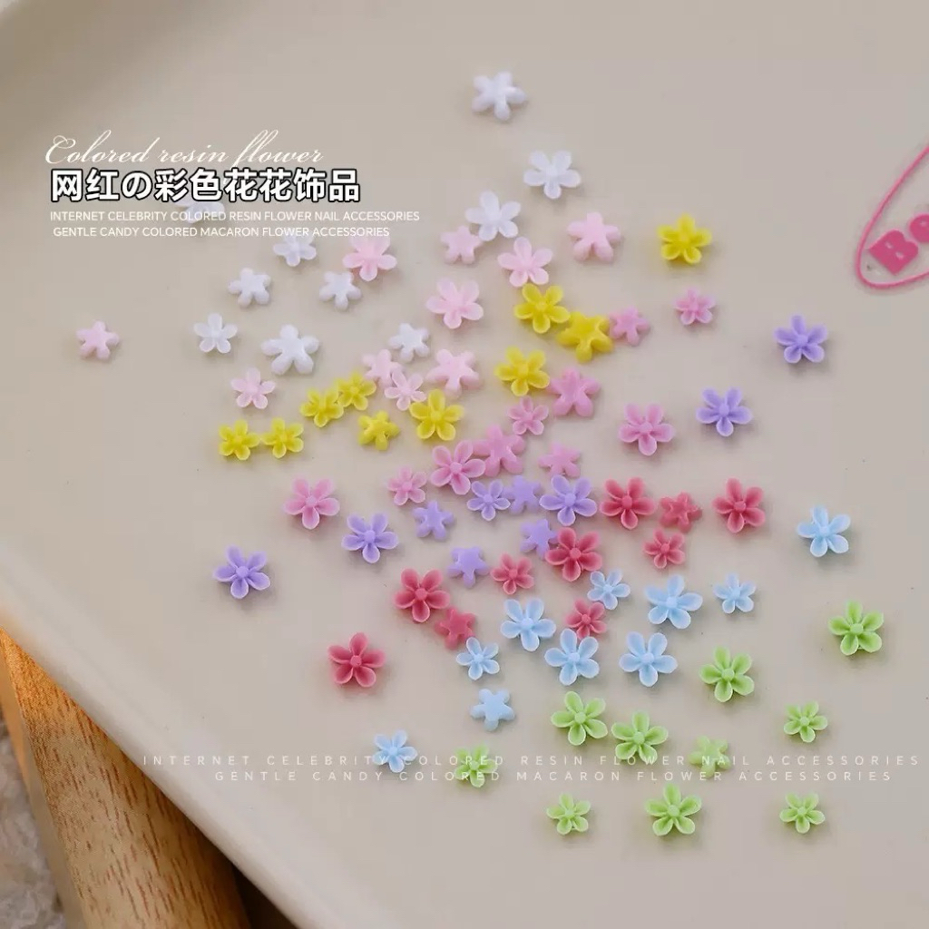 อะไหล่ติดเล็บดอกไม้จิ๋ว คละสี ขนาด 4.5mm./ 6mm. ( 50ชิ้น/แพ็ค )