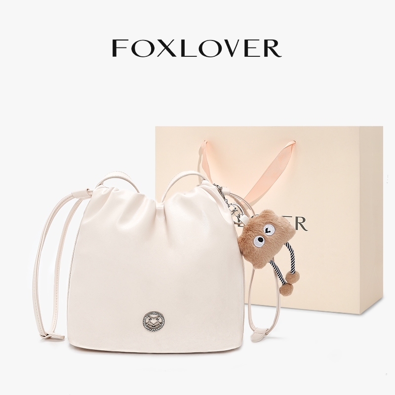 FOXLOVER กระเป๋าโทต้สีขาวความจุมาก สถوانีน้ำสไตล์สบายผู้หญิง แถมไฮ้ลูกนุ่ม + ถุงขวัญ