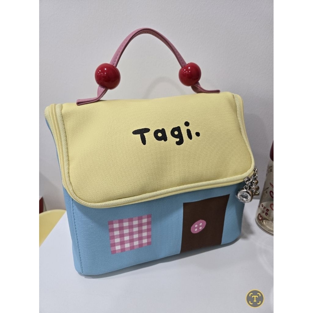 กระเป๋าใส่เครื่องสำอางหรือใส่ของใช้เด็ก Tagi