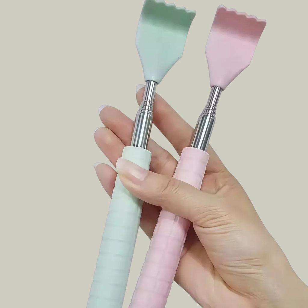 ไม้เกาหลัง ยืดหดได้ ( ด้ามพลาสติก สีหวาน )