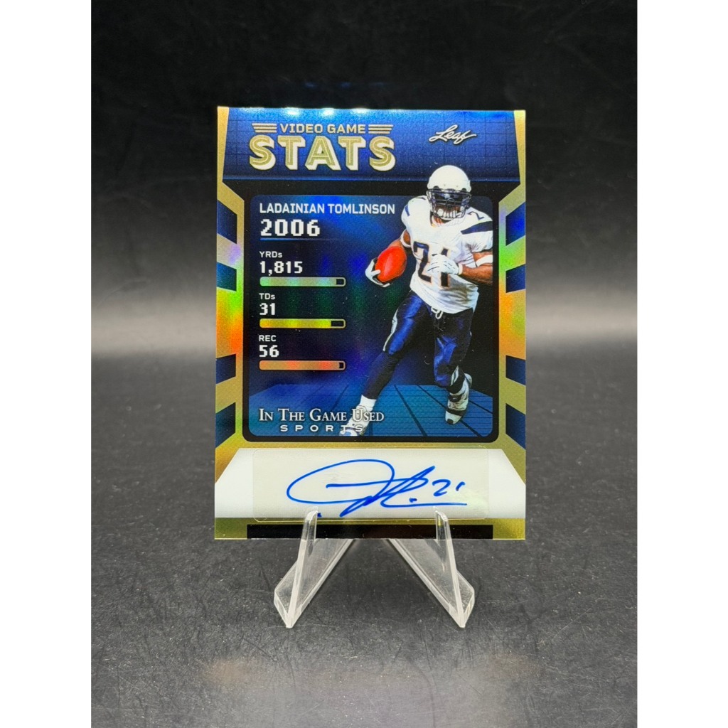 การ์ดอเมริกันฟุตบอลลายเซ็น LaDainian Tomlinson 2025 Leaf In The Game Used Video Game Stats 1/4 (#VG-