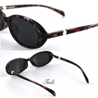 แว่นกันแดด TUDI รุ่น SORA เลนส์ Polarized ( ยกเว้นเลนส์สีส้ม ) ดีไซน์ทรงรีที่ให้ลุคเรียบ เท่ และดูทันสมัย เหมาะสำหรับสาย