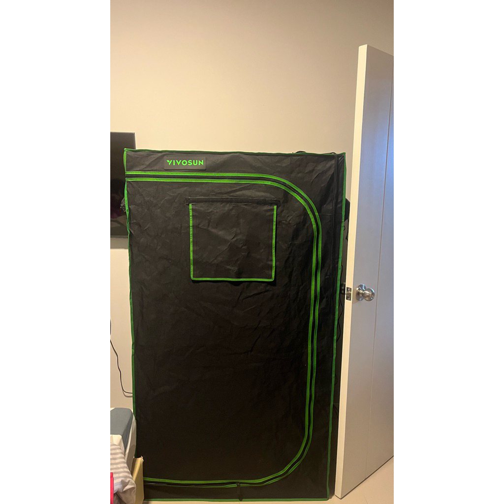 VIVOSUN Grow Tent, which is an enclosed indoor greenhouse environment