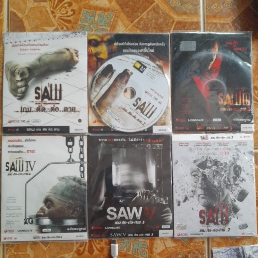 ของสะสม / งานมือ 1 ยังไม่แกะซีล ไม่ผ่านการใช้งาน 🎬]ขายเหมา VCD หนังระทึกขวัญ SAW (เกม ตัด ต่อ ตาย)