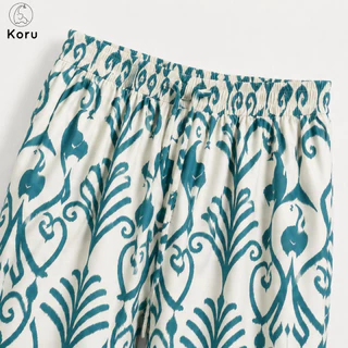 KORU กางเกงขายาวทรงหลวม ลายช้างพิกเซล