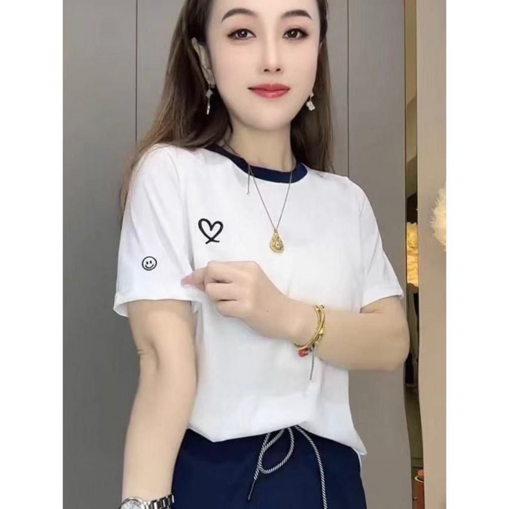 เสื้อยืดแขนสั้นผู้หญิงสไตล์อเมริกัน ดีไซน์เก๋ ลายหัวใจ ดีไซน์ใหม่สำหรับฤดูร้อน คอกลม ดีไซน์สีตัดกัน สวมใส่สบายและเรียบง่