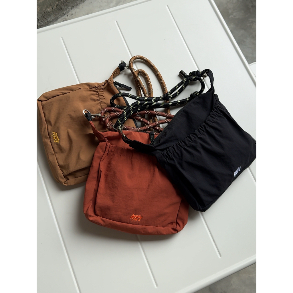 กระเป๋าสะพายพาดลำตัว GATHER MINI CROSSBODY BAG