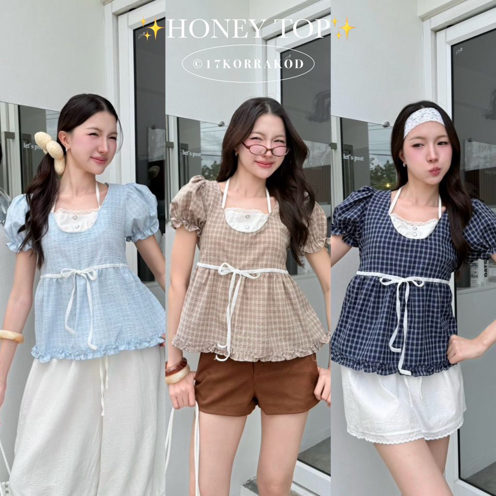 เสื้อแขนตุ๊กตาแต่งเลเยอร์คล้องคอลายสก็อต ดีเทลแต่งกระดุมหน้าริบบิ้นผูกโบว์ น่ารัก เกาหลี ผู้หญิง (Tothemoon)