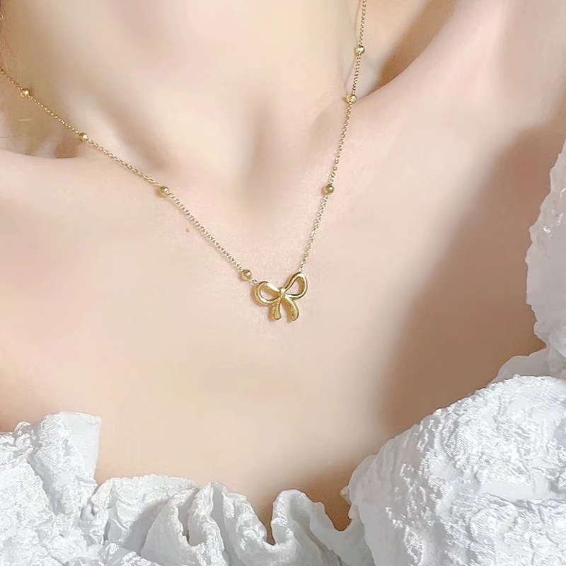 L.N.Jสร้อยคอจี้หัวใจ Love / จี้โบว์ สแตนเลส 304 สีทอง สไตล์เกาหลี มินิมอล สร้อยคอผู้หญิง เครื่องประดับแฟชั่น