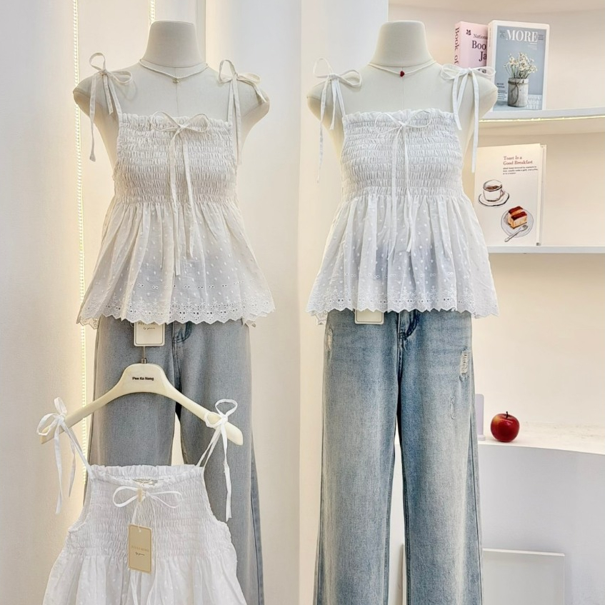 KN.Clothes เสื้อสายเดี่ยวผูกไหล่ เว้าข้าง สม็อคหน้าอก แต่งโบว์ ผ้าปักดอกไม้ Pee Ka Nong