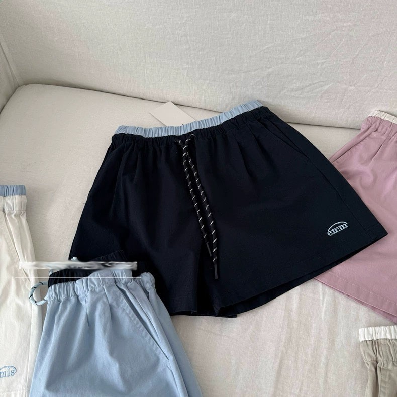 กางเกงขาสั้นกีฬาหลวมๆ เชือกผูกแบบลำลองสำหรับผู้หญิงในช่วงฤดูร้อน กางเกงขายาวสีน้ำเงินกรมท่าใหม่ที่ไม่ซ้ำใครและสวยงาม