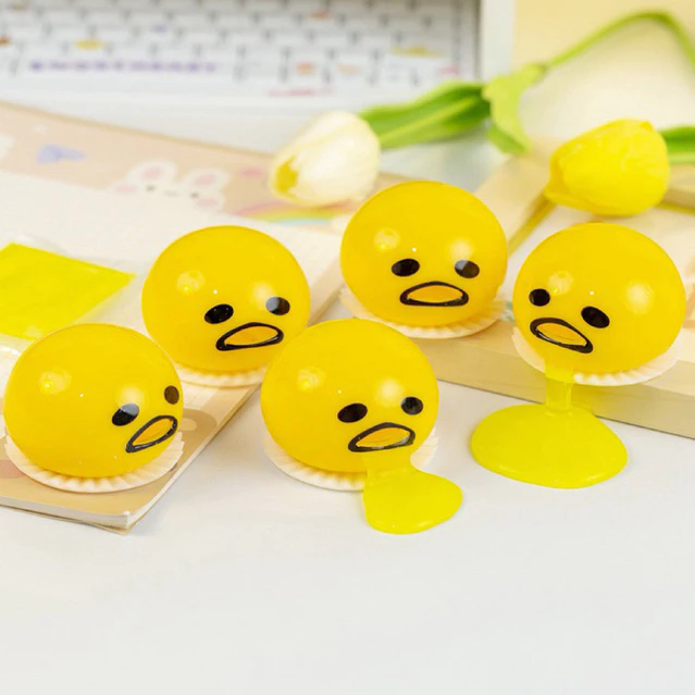 ช่องระบายอากาศจำลองการบีบไข่สนุกแผงขายตลกสร้างสรรค์ขายดีไม่สามารถบดบีบไข่แดงสองฟองคลายความดันต่อกล่อง 12 ชิ้น