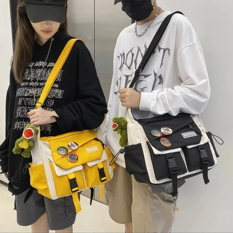 กระเป๋าสะพายไหล่ ลําลอง ผ้าแคนวาส ขนาดใหญ่ จุของได้เยอะ สไตล์ญี่ปุ่น สตรีท สําหรับผู้ชายและผู้หญิง