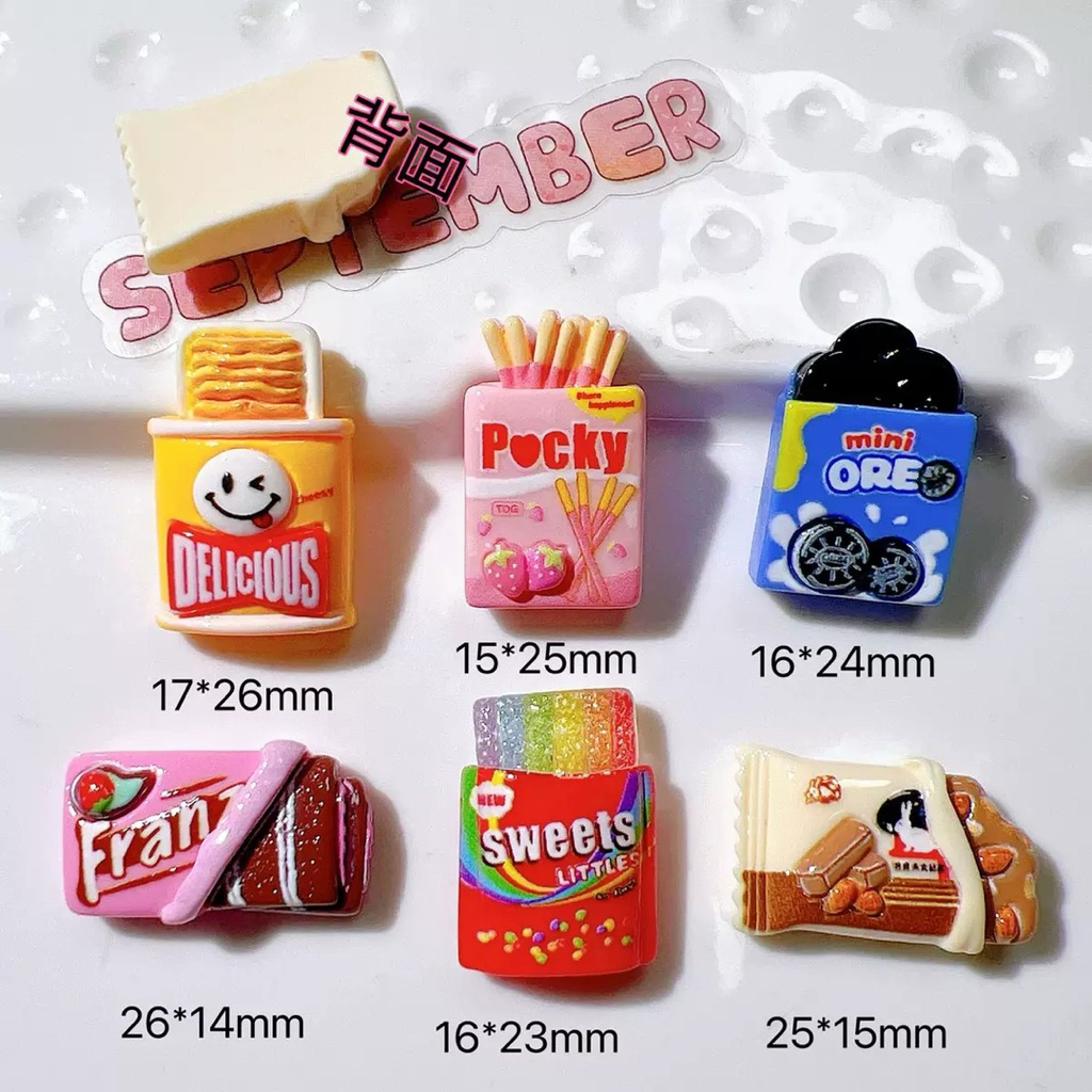 พร้อมส่ง เรซิ่นตกแต่ง การ์ตูน โอริโอ้ ขนม ขนมปัง ลูกอม sweet 1 set 6 ชิ้น(เฉพาะตัวเรซิ่นอย่างเดียว)เคส ยาดม หงส์ไทย diy ราคา ถูกที่สุด ดีลบีเคเค แกลเลอรีภาพที่ 4