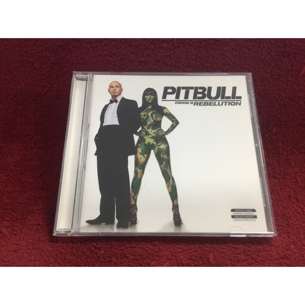 CD Pitbull – Rebelution  สภาพตามปก CA9-57