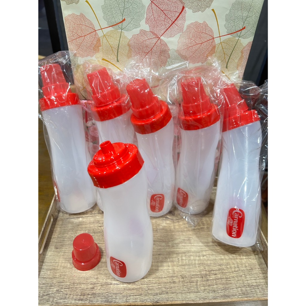 (ขายส่งยกลัง 24ใบ) ขวดบีบซอสคาร์เนชั่น 750ml ml รุ่นมีฝาครอบจุก - รูปที่ 2