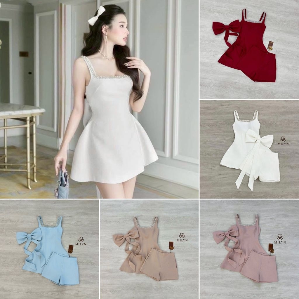 Milyn มินิเดรสตัวเดรสแขนกุดแต่งอะไหล่เพชรขอบชุดช่วงอกเชื่อมไปด้านหลัง และมีอะไหล่โบว์ใหญ่