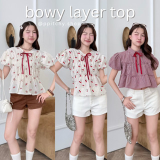 ppitchy.shop ❤️ Bow Layer Top - เสื้อระบาย แขนพอง แต่งโบว์ผู…