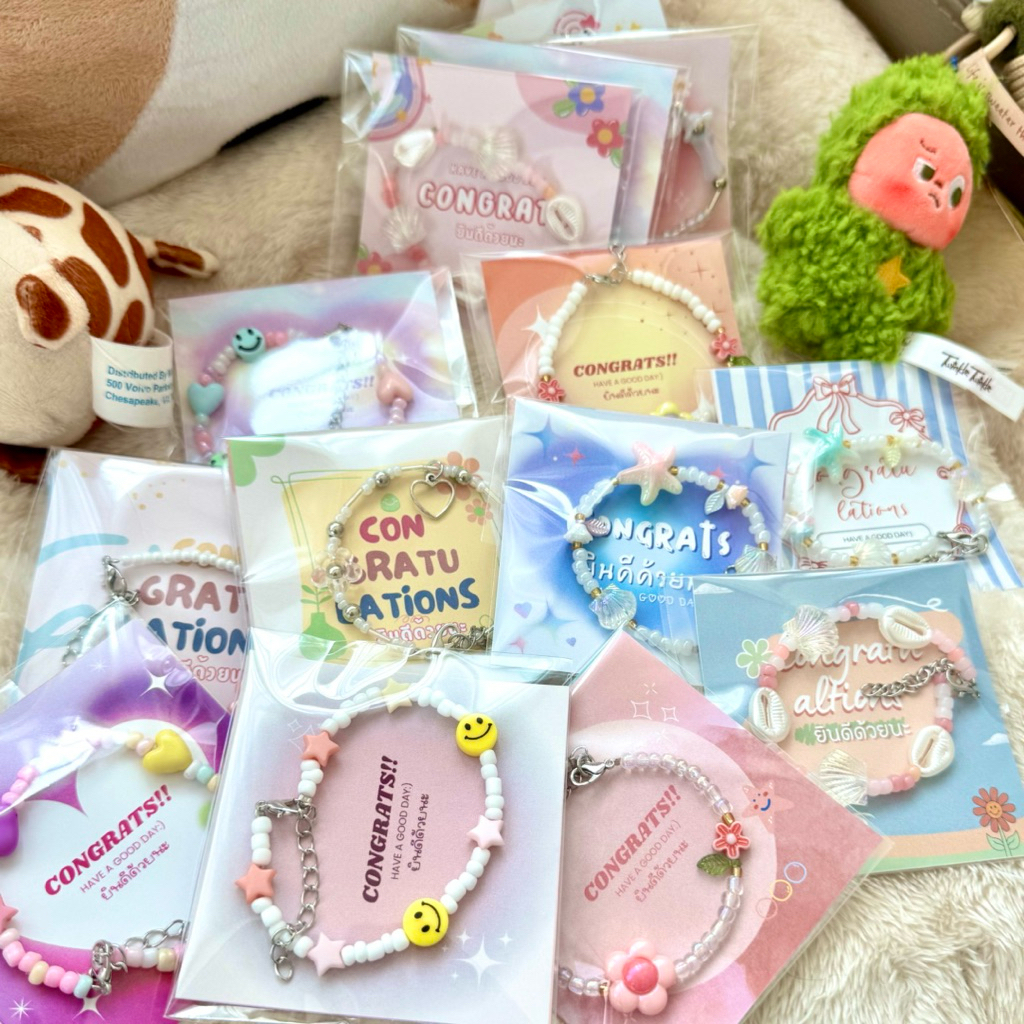 ของแจกปัจฉิม ของขวัญปัจฉิม การ์ด+สร้อยข้อมือ  พร้อมแพ็คเกจน่ารักทุกลาย (ร้านส่งคละลาย)