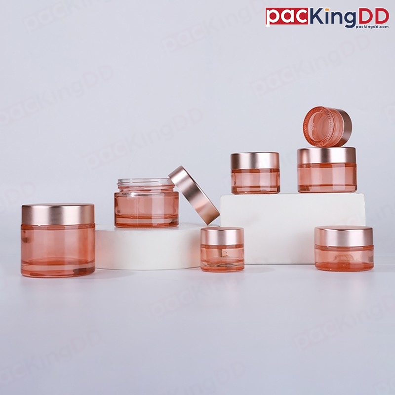 (แพ็ค 10 ชิ้น) กระปุกครีมแก้ว สีชมพูใส ฝาสีโรสโกลด์ด้าน ขนาด 5-100 กรัม #P393RG-M-Pre ตลับครีม ขวดแก้ว ตลับ PackingDD