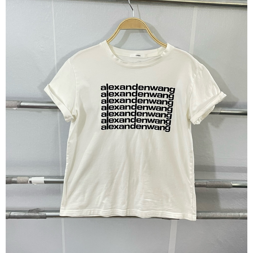 รหัส  546🍊 เสื้อยืด Alexander Wang รุ่น Puff Logo T-Shirt ผลิตจากผ้าฝ้ายพร้อมลายพิมพ์โลโก้