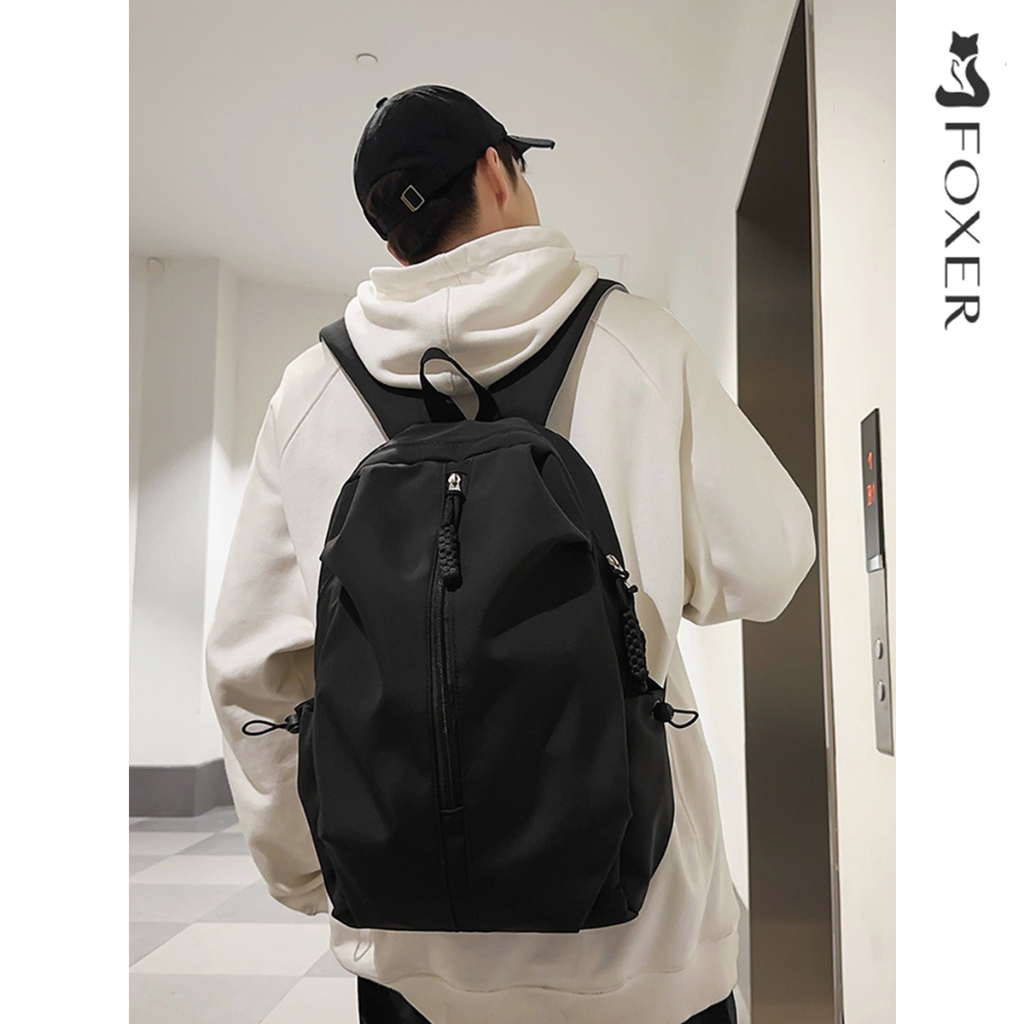 FOXER กระเป๋าเป้สะพายหลังอเนกประสงค์ กระเป๋านักเรียน Unisex คุณสมบัติกันน้ำ กระเป๋าเป้สะพายหลังสำหรับท่องเที่ยว