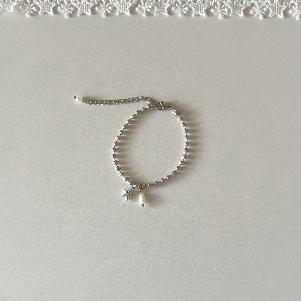 tiny star and pearl สร้อยข้อมือสแตนเลสจี้ดาวและมุกแท้