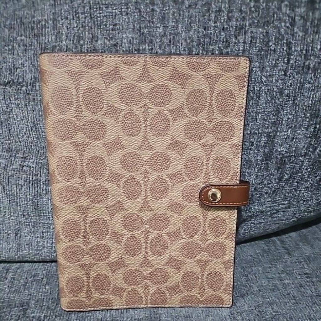 Authentic coach notebook in brown color. Brand new qith tag