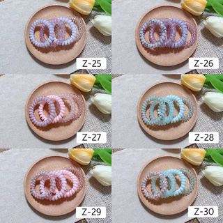 [5.5cm] ยางมัดผมสปริง ยางรัดผมสายโทรศัพท์ ราคาต่อ1เซต(1เซตได้4ชิ้นตามภาพ)