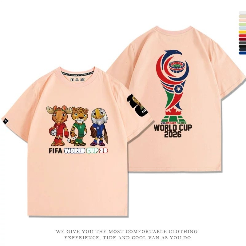 (รุ่นสีชมพู) 2026 มาสคอต FIFA World Cup World Cup Short sleeved T-shirt การพิมพ์แบบหลวม ๆ สำหรับผู้ชายและผู้หญิง