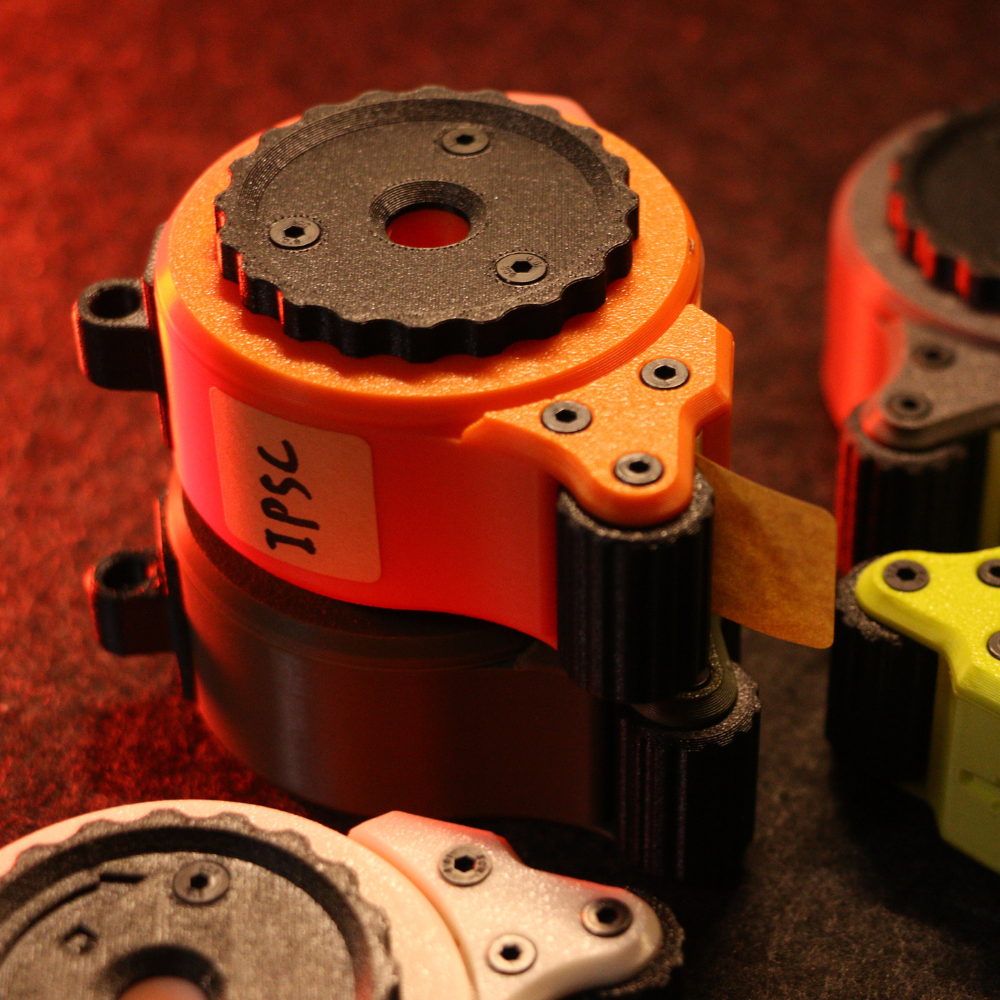 เครื่องจ่ายเทปปะเป้าพกพา Universal (รองรับ 22-25mm) แท่นดึงเทปซ่อมเป้าสนาม IPSC / IDPA แถมฟรี! เทปวงกลม 500 ชิ้น
